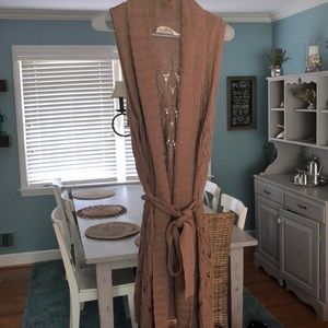 Sleeveless sweater wrap